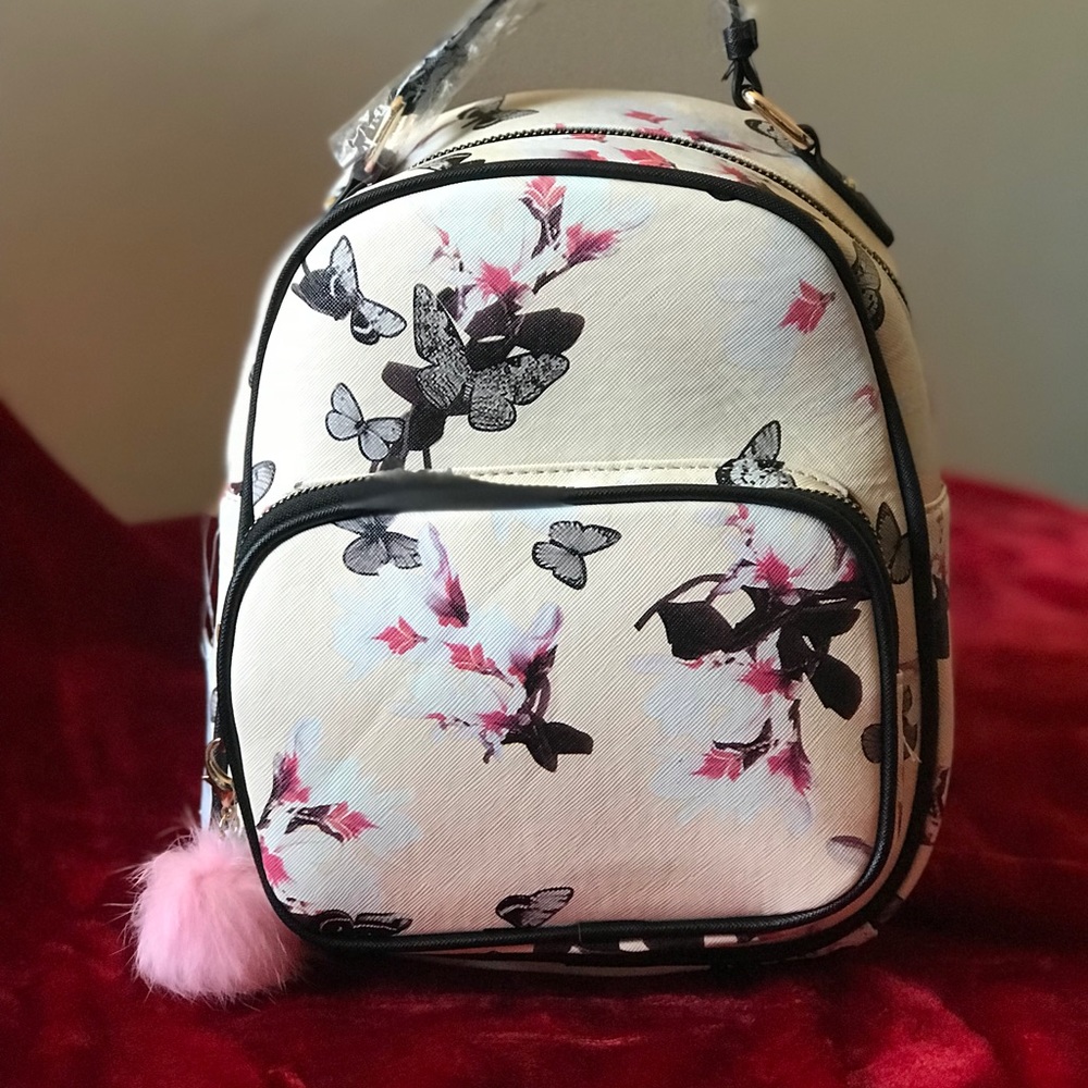 Beautiful satchel handbag with butterflies design